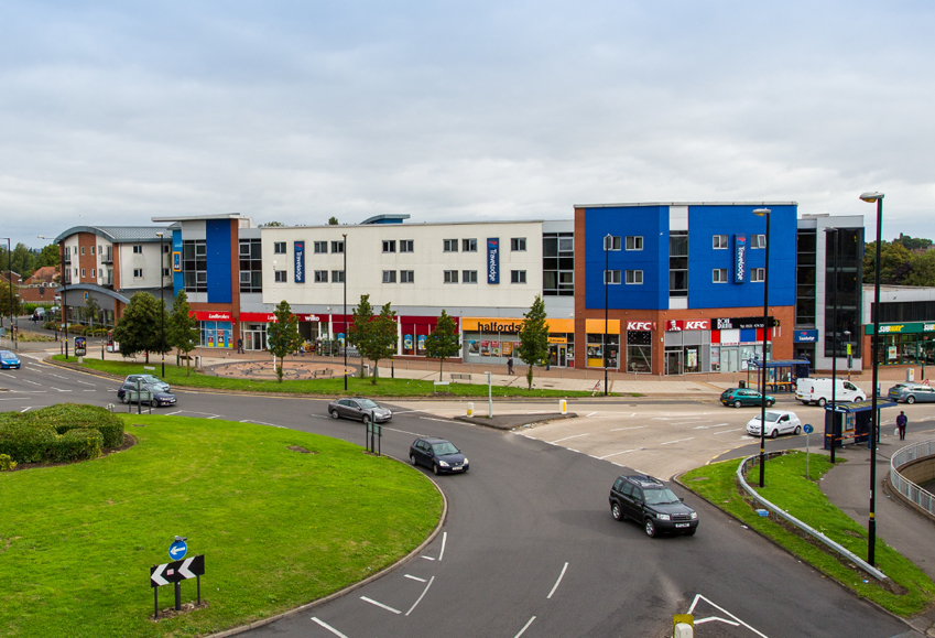 Alcester Road South in Birmingham with roundabout in foreground - Bond Wolfe commercial property acquisition case studies